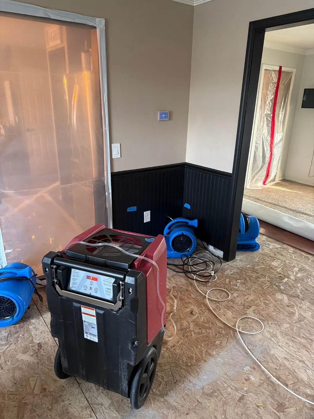 Air movers and dehumidifiers running in Lebanon Indiana home dry-out